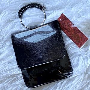 Black iridescent mini crossbody bag, can also be worn as a wristlet